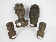 Easter Island Moai style ornaments, largest approximately 23 cm (h).