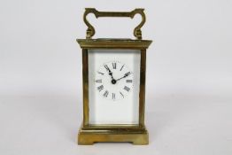 A French brass and glass Anglaise styled case carriage timepiece clock,