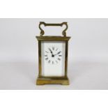 A French brass and glass Anglaise styled case carriage timepiece clock,