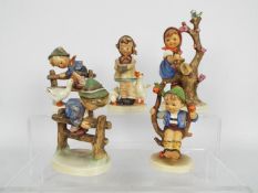 Five Hummel figurines, predominantly children with animals, largest approximately 15 cm (h).