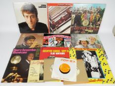 A small quantity of vinyl records to include The Beatles Sgt Pepper's Lonely Hearts Club Band