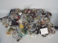 A quantity of costume jewellery, predominantly individually bagged, to include bracelets, necklaces,