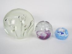 A very large and heavy glass paperweight,