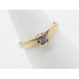 A 9 carat yellow gold cluster ring, the crown set with four 5-point stones, size K+½, approx 1.
