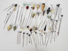 A varied collection of vintage veil and hat pins.