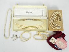 A collection of pearl necklaces, a pair of pearl and 9ct gold earrings,