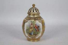 A Dresden porcelain pot pourri vase and cover decorated with panels of courting couples set between