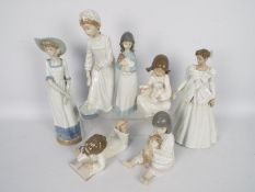A collection of Nao figurines, children and ladies, largest approximately 32 cm (h).