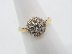 An 18ct yellow gold diamond cluster ring, size K,