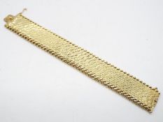 A yellow metal bracelet stamped 375 (9 carat gold), approx 18 cm (length) x 2.