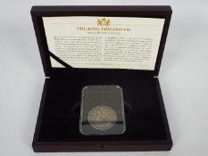 A coin presentation pack by CPM, comprising an encapsulated King Edward VII 1902 Silver Crown,