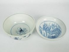 Lot to include a blue and white shallow bowl, decorated to the interior with dragon and fish,