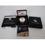 A United States Mint 2019 proof silver dollar commemorating the 50th anniversary of the first