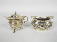 George V silver to include an open salt with repousse decoration, Birmingham assay 1910,
