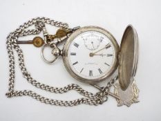 A George V silver cased full hunter pocket watch, movement and dial signed Thomas Russell & Son,