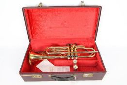 A Zenith Mk III trumpet by J R LaFleur, contained in plush lined case.