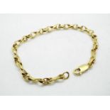 A yellow metal chain marked 750 (18 carat gold), approx 18.5 cm (length), approx 13.