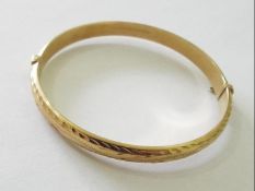 A hallmarked 9 carat gold bangle, approx weight 7.