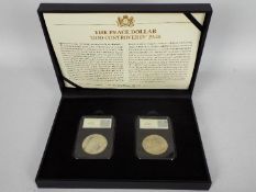 A CPM presentation set, The Peace Dollar God Controversy Pair,