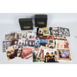 The Beatles - Two compact disc box sets comprising The Singles Collection and The EP Collection.
