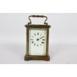 A French brass and glass Corniche styled case carriage timepiece clock,