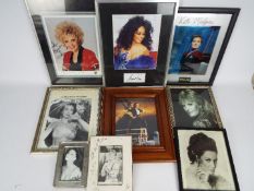A quantity of framed images of actors and singers, predominantly signed to include Brenda Lee,
