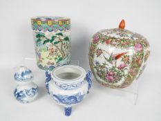 Chinese ceramic group to include a blue and white censer with twin chilong handles and tripod mask