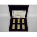A Windsor Mint, limited edition, 24ct gold plated Pounds Ingots set,