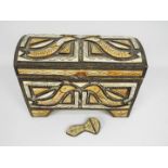 A metal clad casket with inlaid decoration and twin handles, approximately 21 cm x 32 cm x 18 cm.