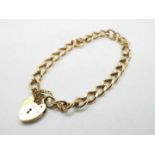 A 9 carat gold chain bracelet with padlock clasp, the chain approx 19 cm (length), approx weight 12.