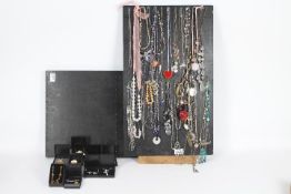 Costume jewellery - two display boards and a box containing costume jewellery predominantly
