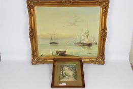 A framed oil on canvas depicting a coastal scene with figures on the shore line,