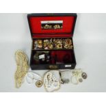 A jewellery box containing a large quantity of good quality costume jewellery