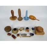 A collection of sewing accessories to include natural shell pin cushions,