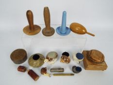 A collection of sewing accessories to include natural shell pin cushions,