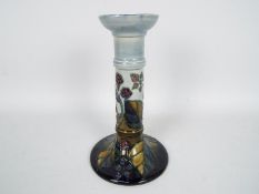 Moorcroft - A Moorcroft Pottery candlestick decorated in the Bramble pattern,