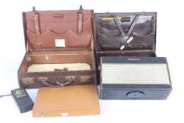 Two vintage brief cases, a Roberts radio and similar.