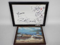 A small oil painting depicting boats on a beach, signed lower right Harris, framed under glass,