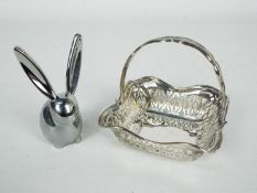 A George V silver basket of small form with pierced decoration,