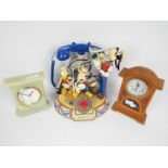 A Disney Mickey's Dixieland Band, musical animated telephone and two clocks, one onyx cased.