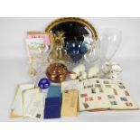 A mixed lot to include an oval wall mirror, glassware, ceramics, stamps and other.