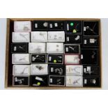 Costume Jewellery - a display case of sterling silver jewellery to include brooches, necklaces,