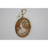 A vintage 9ct gold mounted cameo brooch with safety chain, approximately 4.3 cm x 3.3 cm, 9.