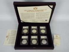 The Complete Morgan Dollar Mintmark Collection by CPM comprising five encapsulated Morgan Dollars