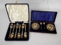 A cased set of six silver coffee spoons,