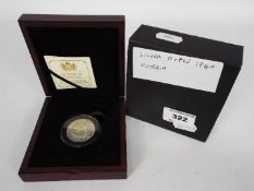 An encapsulated 1840 One Rupee coin in presentation box by CPM, with certificate of provenance.