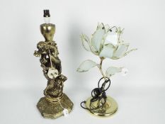 Two table lamps, one in the form of a flower, the other in the form of a dragon,