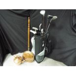 Golfing - a modern golf bag containing eight golf club to include Mercury, Bomber,