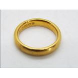 A 22 carat gold wedding band, Birmingham hallmark, size I+½, approx 5.