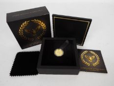 A limited edition, Perth Mint, encapsulated ¼ oz gold proof coin,